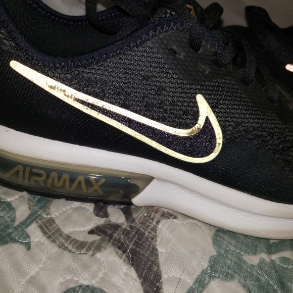 Nike airmax,  size 7Youth. They are black with a purple swoosh. - Picture 2 of 10